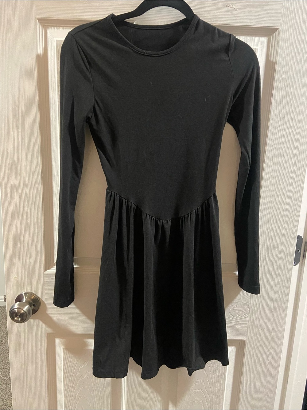 Simple black knee length dress